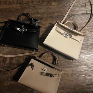 Elegant Black, Cream, and Tan Handbag Set